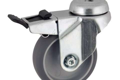 Zinc plated total lock caster 75mm for light trolleys,wheel made of grey rubber,double ball bearings.Hollow rivet
