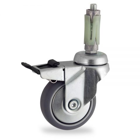 Zinc plated total lock caster 125mm for light trolleys,wheel made of grey rubber,double ball bearings.Fitting with round expander socket 23/26