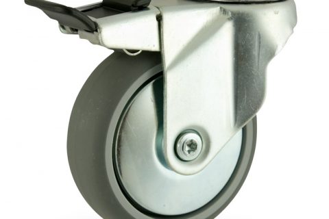 Zinc plated total lock caster 100mm for light trolleys,wheel made of grey rubber,plain bearing.Hollow rivet