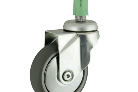 Zinc plated swivel caster 75mm for light trolleys,wheel made of grey rubber,double ball bearings.Fitting with square expander socket 31/35