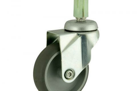 Zinc plated swivel caster 100mm for light trolleys,wheel made of grey rubber,double ball bearings.Fitting with round expander socket 19/23