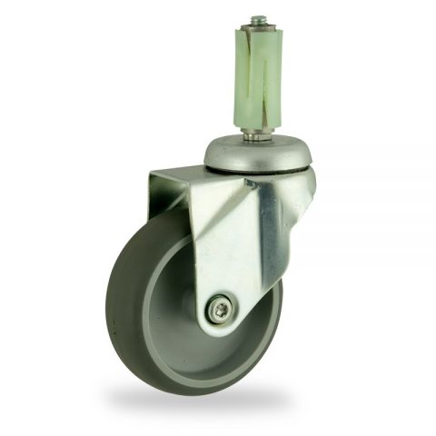 Zinc plated swivel caster 75mm for light trolleys,wheel made of grey rubber,plain bearing.Fitting with round expander socket 19/23