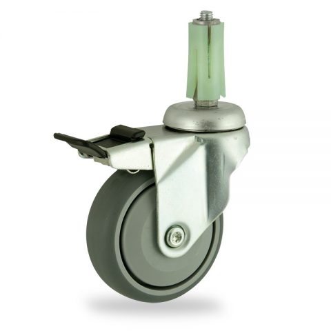 Zinc plated total lock caster 100mm for light trolleys,wheel made of grey rubber,single precision ball bearing.Fitting with round expander socket 19/23