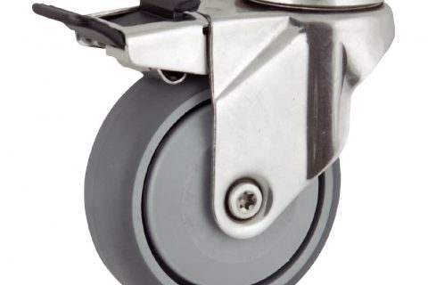 Stainless total lock caster 100mm for light trolleys,wheel made of grey rubber,single precision ball bearing.Hollow rivet
