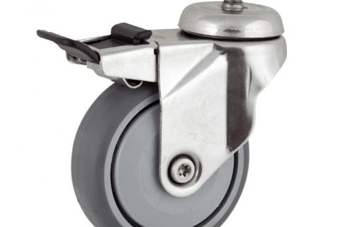 Stainless total lock caster 75mm for light trolleys,wheel made of grey rubber,single precision ball bearing.Threaded stem fitting