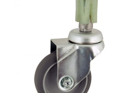 Zinc plated swivel caster 100mm for light trolleys,wheel made of grey rubber,double ball bearings.Fitting with square expander socket 31/35