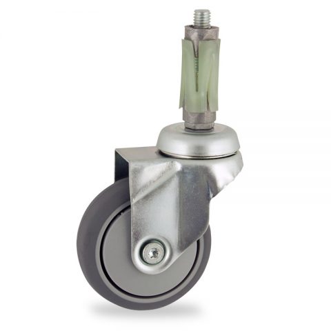 Zinc plated swivel caster 75mm for light trolleys,wheel made of grey rubber,plain bearing.Fitting with round expander socket 23/26