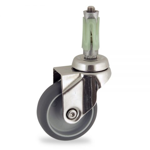 Stainless swivel caster 100mm for light trolleys,wheel made of grey rubber,double ball bearings.Fitting with round expander socket 26/30